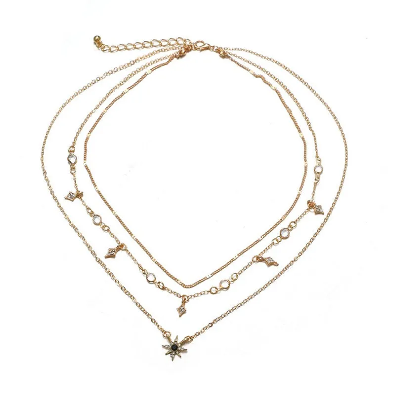 Handmade alloy multi-layer star pendant necklace in gold colour with layered chains and star pendants