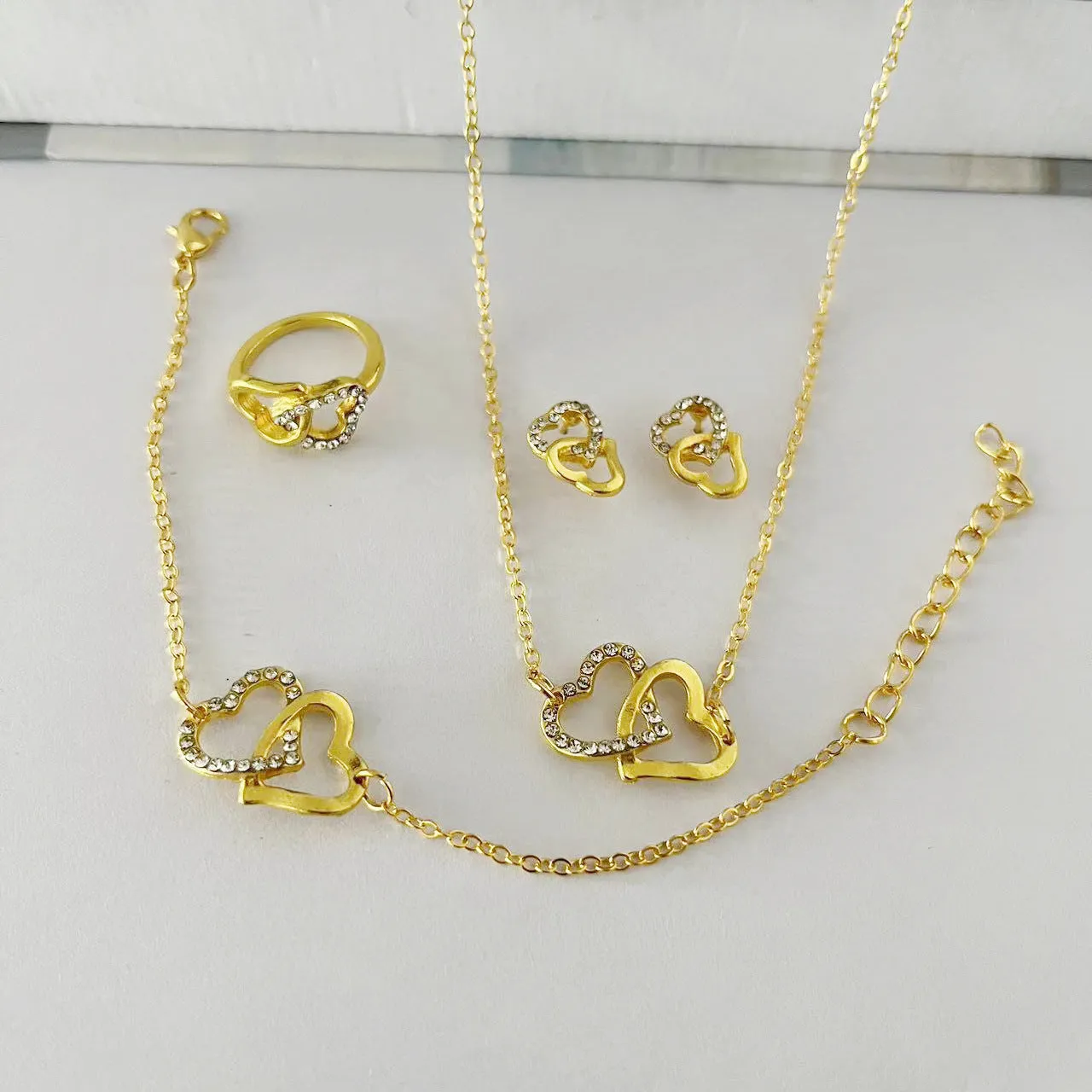 Five-piece butterfly pendant jewellery set for women including necklace earrings ring bracelet in black alloy electroplated finish