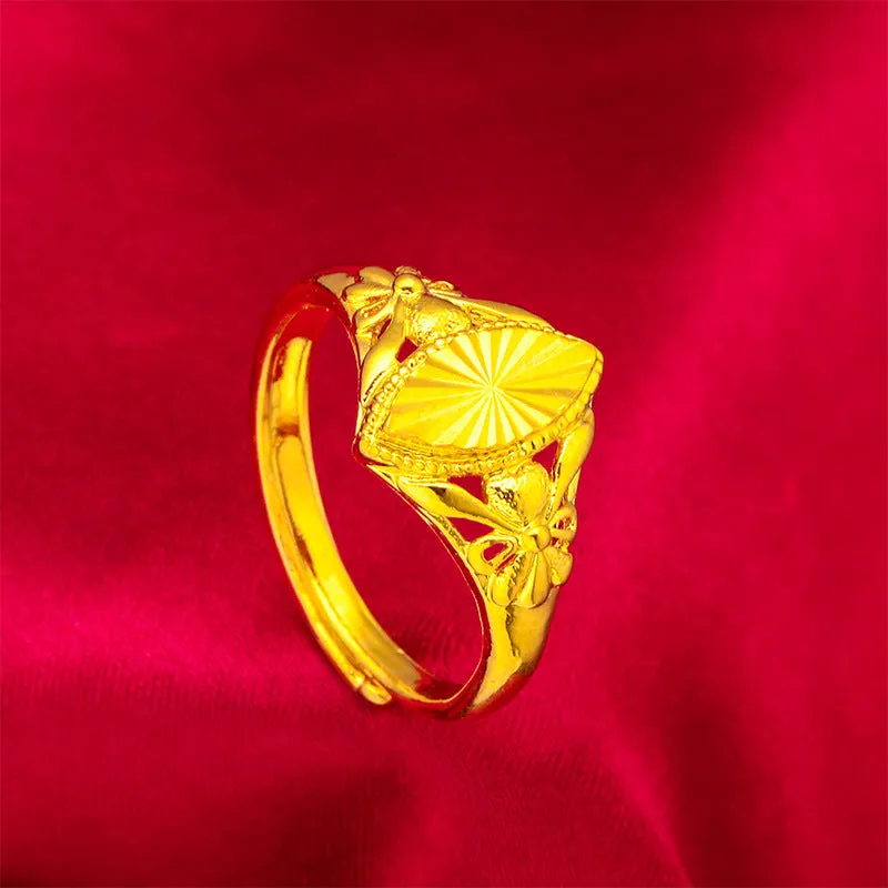 Geometric open flower ring with gold electroplated finish and textured brass surface