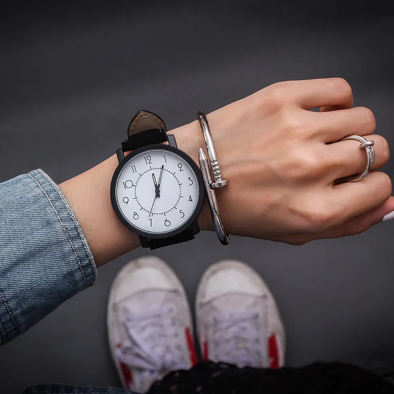 Women's quartz watch with large 42mm round dial, imitation leather strap, and pin buckle in Rubik's Cube Black colour