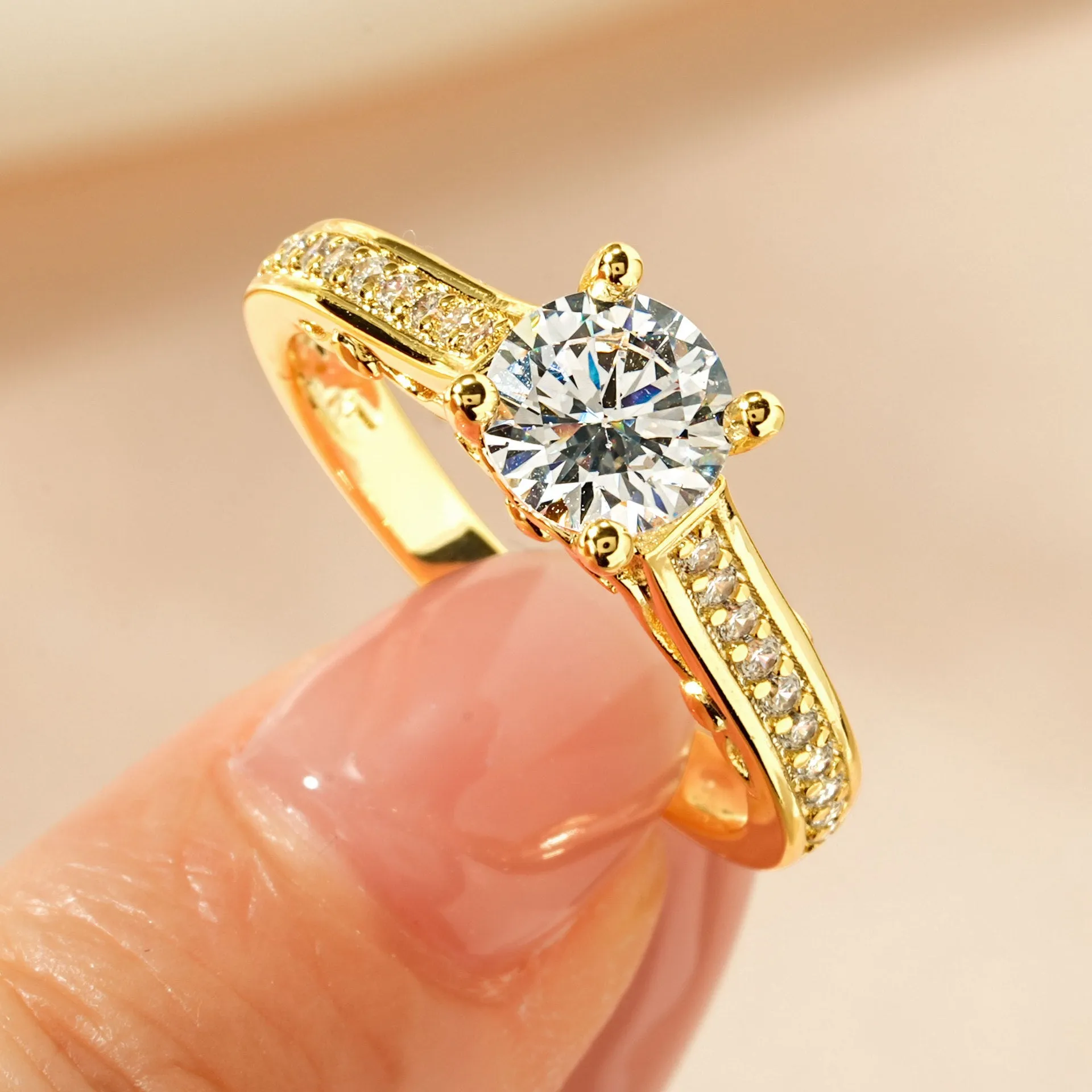 Women's electroplated zircon ring in heart, split, or star design on a copper base, shown in K white or K yellow gold colour.