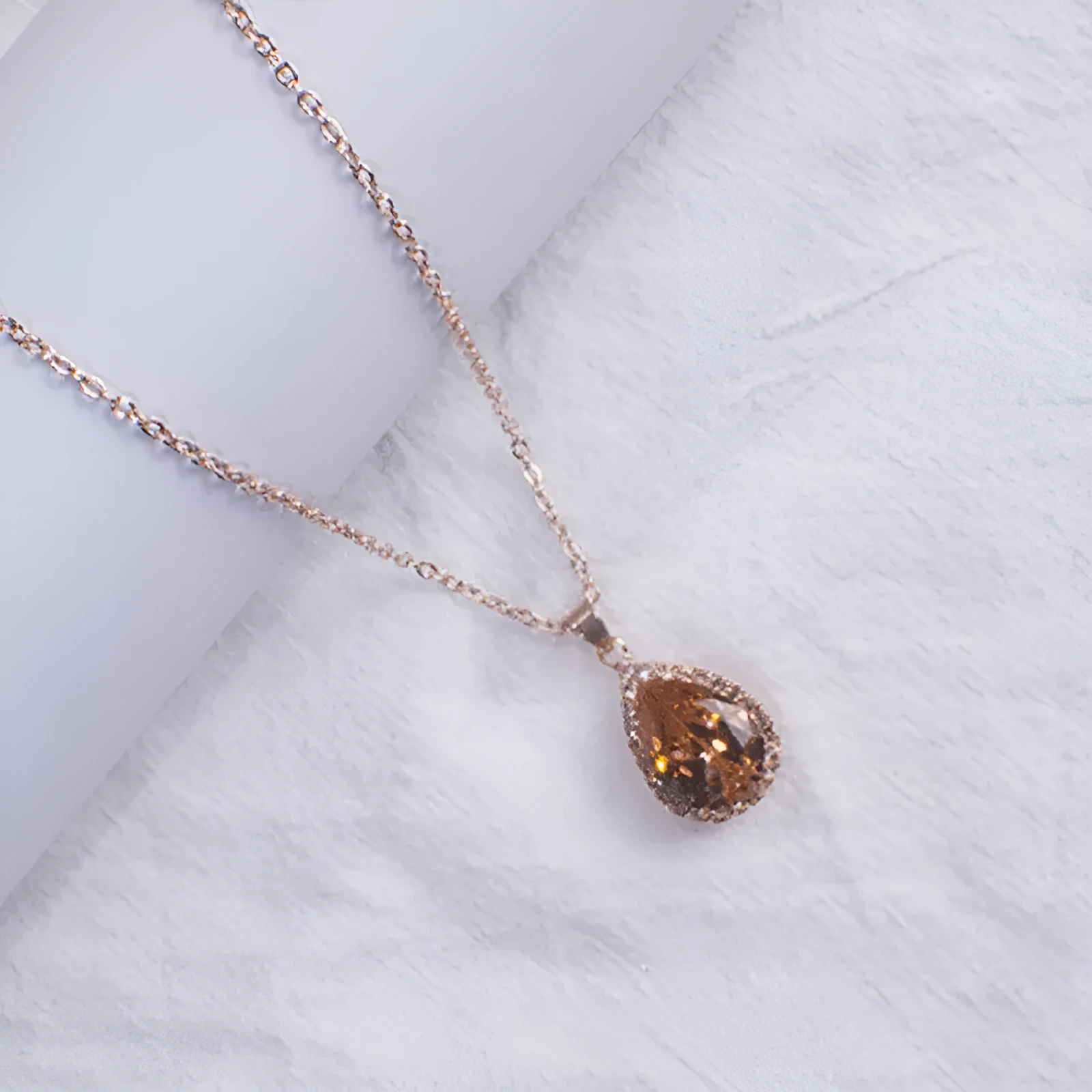 Women's drop shape necklace with geometric rhinestone pendant in multiple colour options