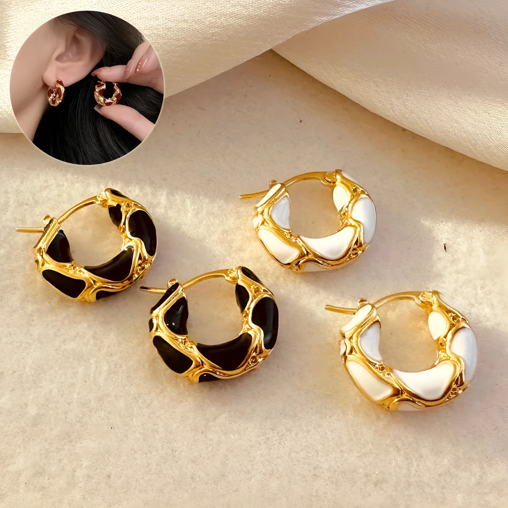 Gold plated alloy small hoop earrings with enamel colour in red, black, and white geometric shapes