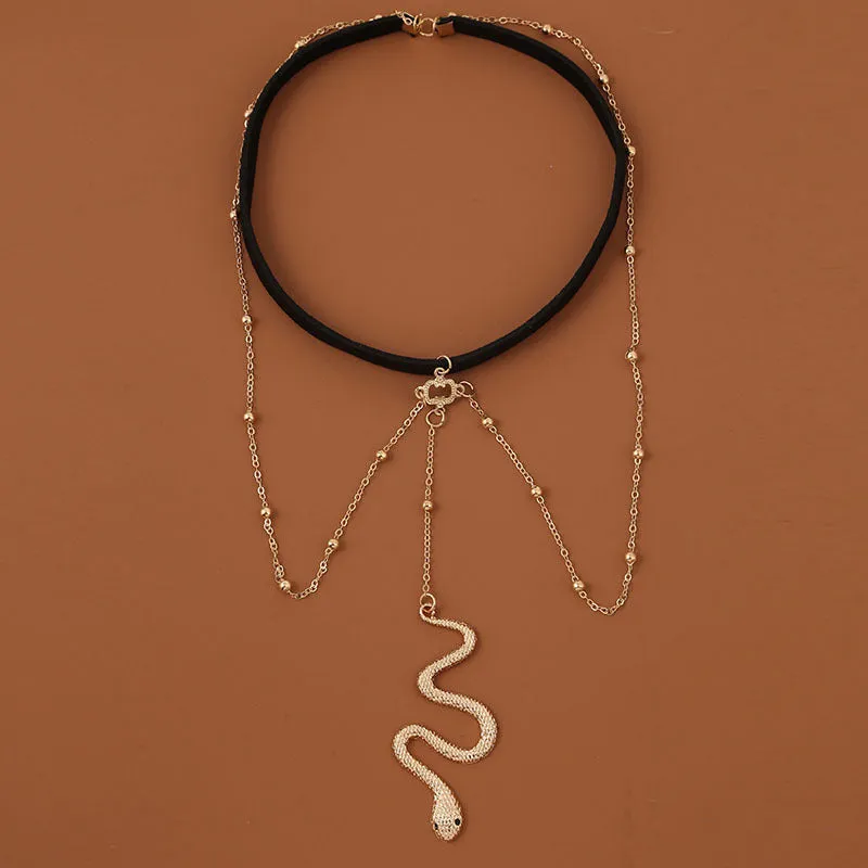 Women's white pearl multi-layer geometric body chain anklet on a light background