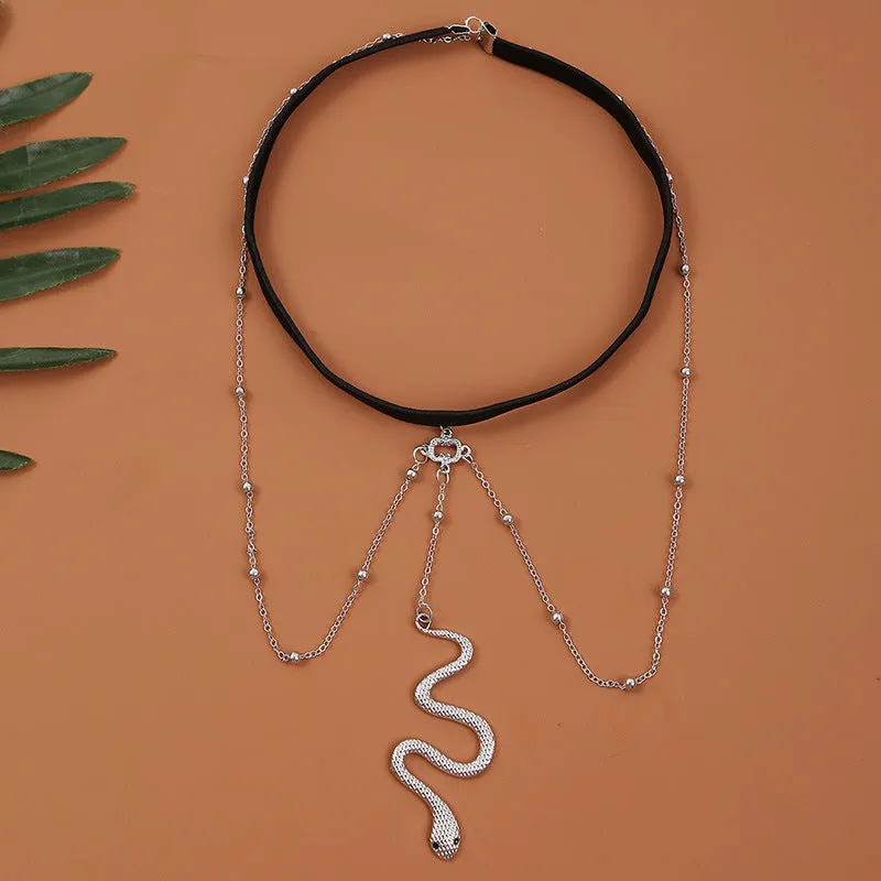 Women's white pearl multi-layer geometric body chain anklet on a light background