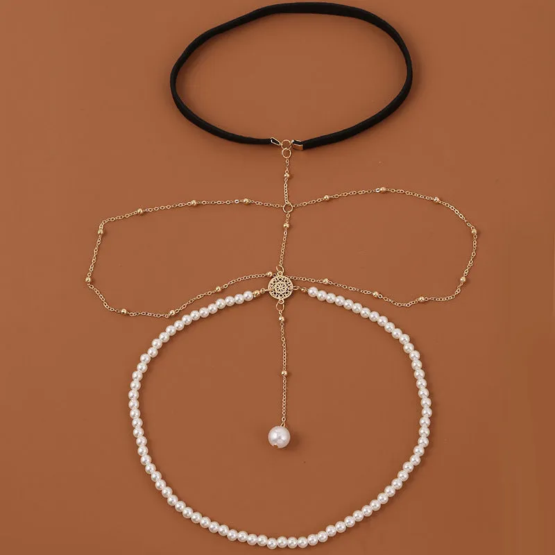 Women's white pearl multi-layer geometric body chain anklet on a light background