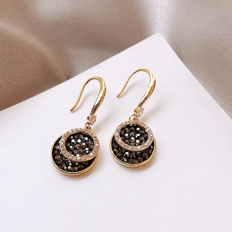 Black geometric alloy earrings with round pieces and 3.6cm length, retro Hong Kong style design.