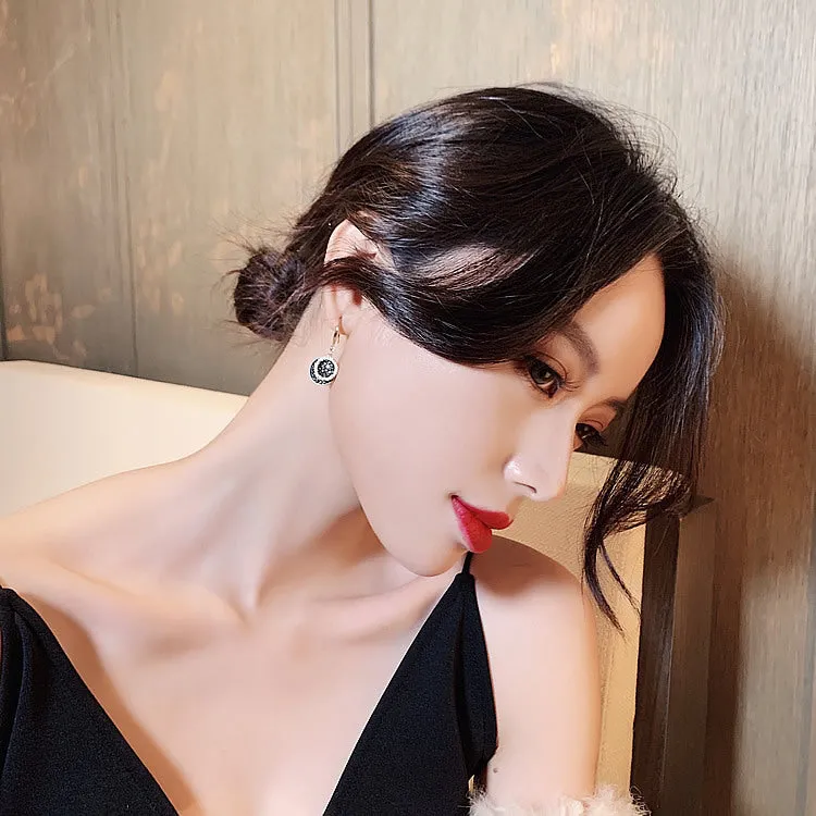 Black geometric alloy earrings with round pieces and 3.6cm length, retro Hong Kong style design.