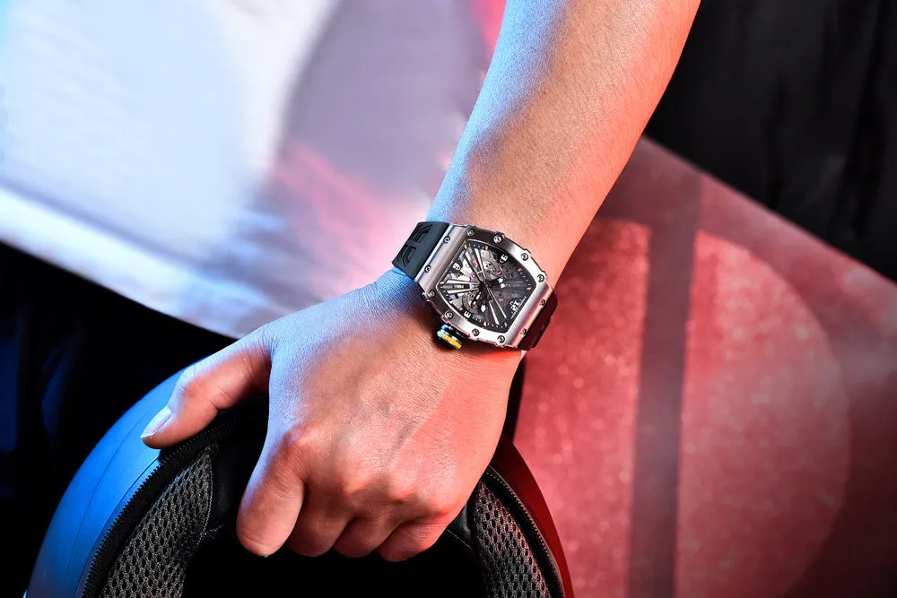 Square men's quartz calendar watch with hollowed design, stainless steel case, 42mm dial, rubber strap in black