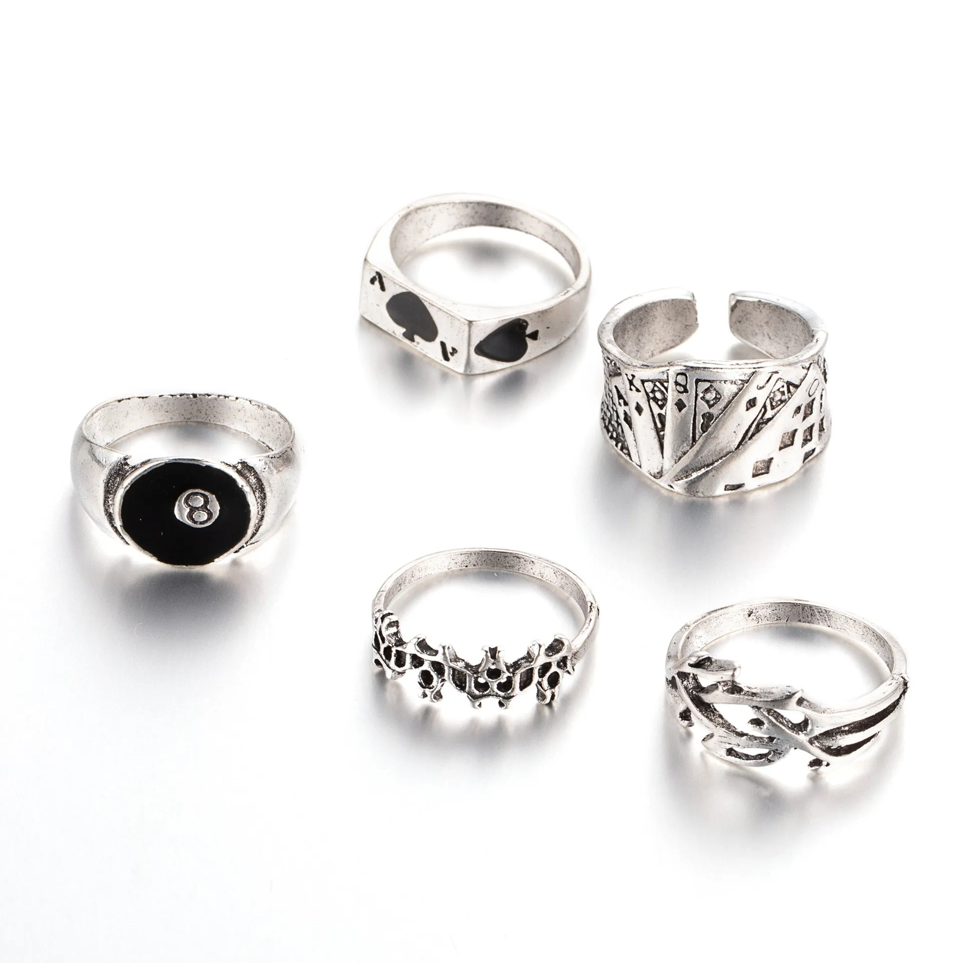 Black alloy poker ring with retro spade card design showing adjustable sizing feature