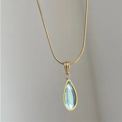 Retro water drop necklace for women with blue gemstone pendant on titanium steel snake bone chain.