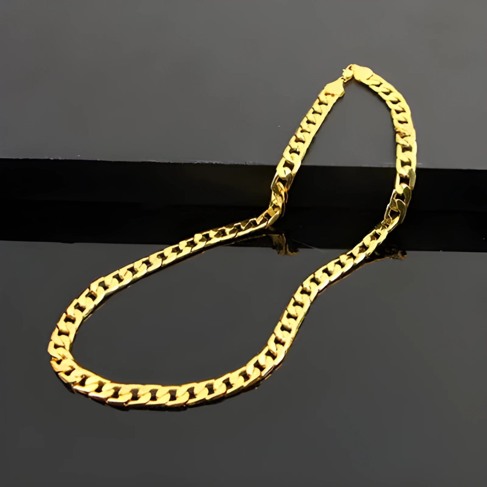 Men's flat side NK necklace large chain 60cm golden finish on display