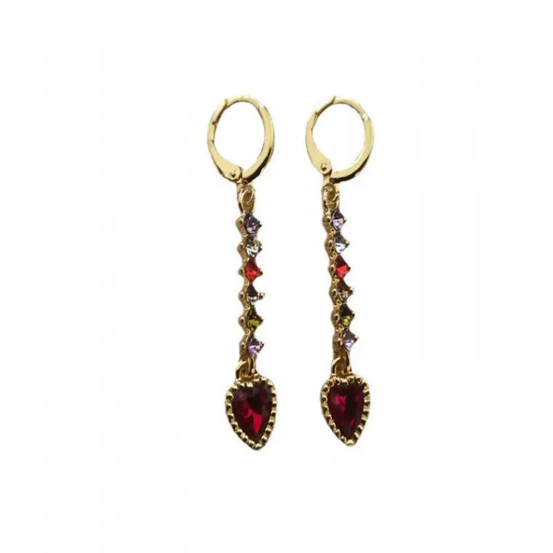 Pair of women's heart-shaped alloy earrings with electroplated gold or silver finish.