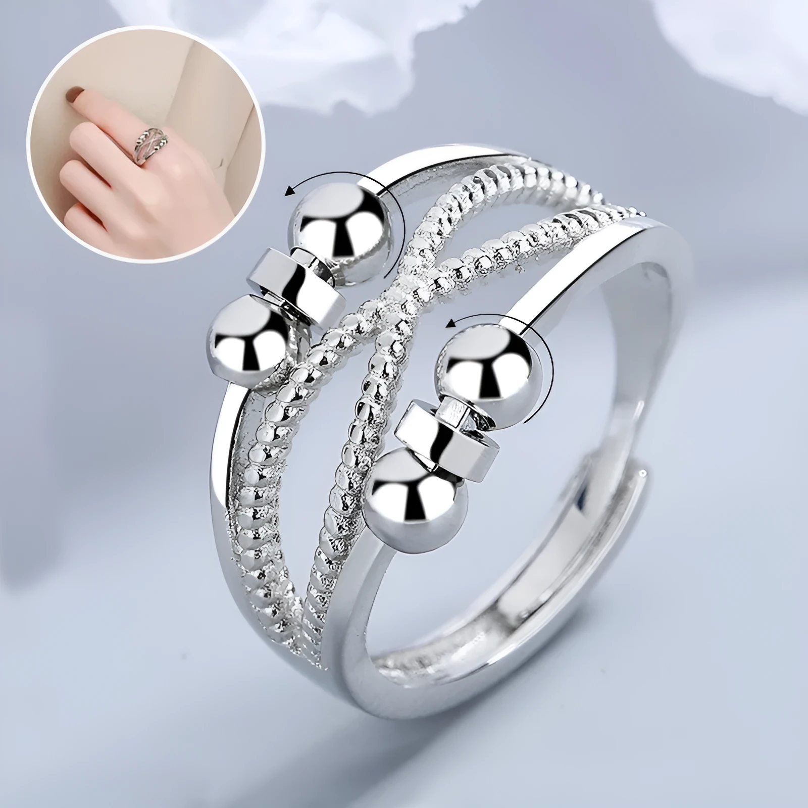 Rotatable copper ring with open design double-layered hollow line construction in platinum colour geometric shape