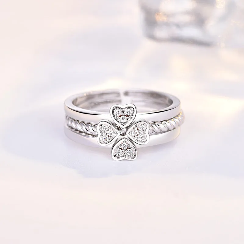Four-leaf clover adjustable ring set for women with spinning top and zircon stones in white gold finish