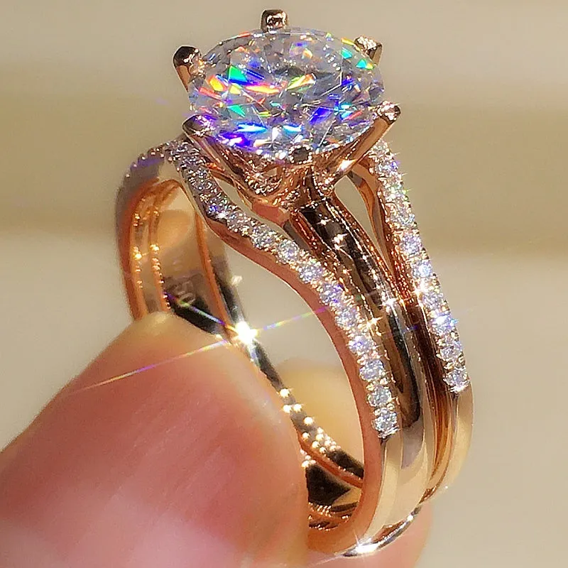 18K gold Mosonite matching ring with D colour stone in rose gold finish on white background