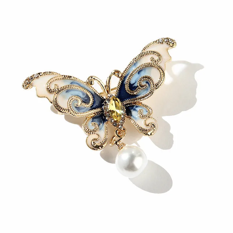 European and American style butterfly brooch in zinc alloy with artificial gems in blue, green, and red colours