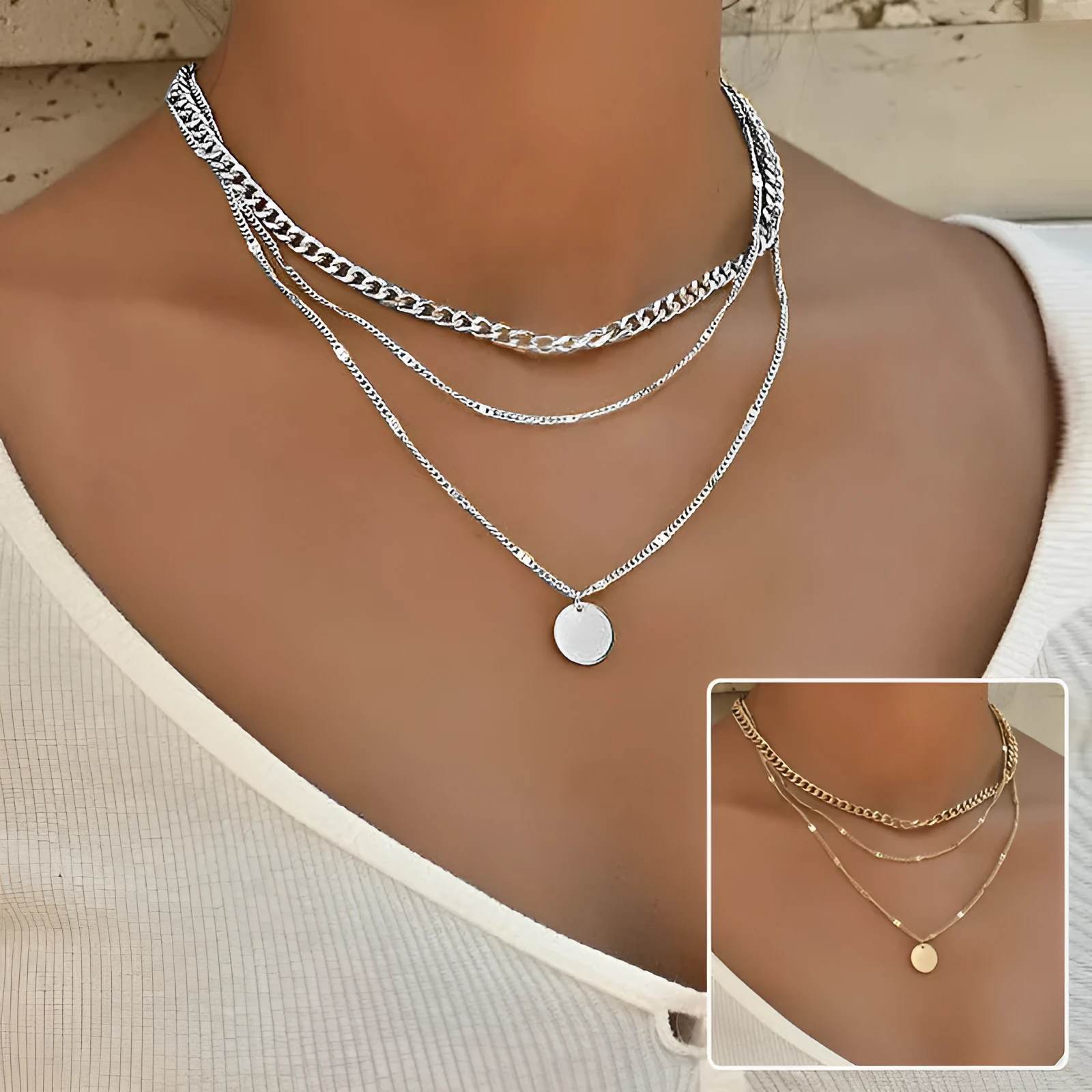 Women's multilayer disc pendant clavicle necklace in gold and silver colour finish on a light background