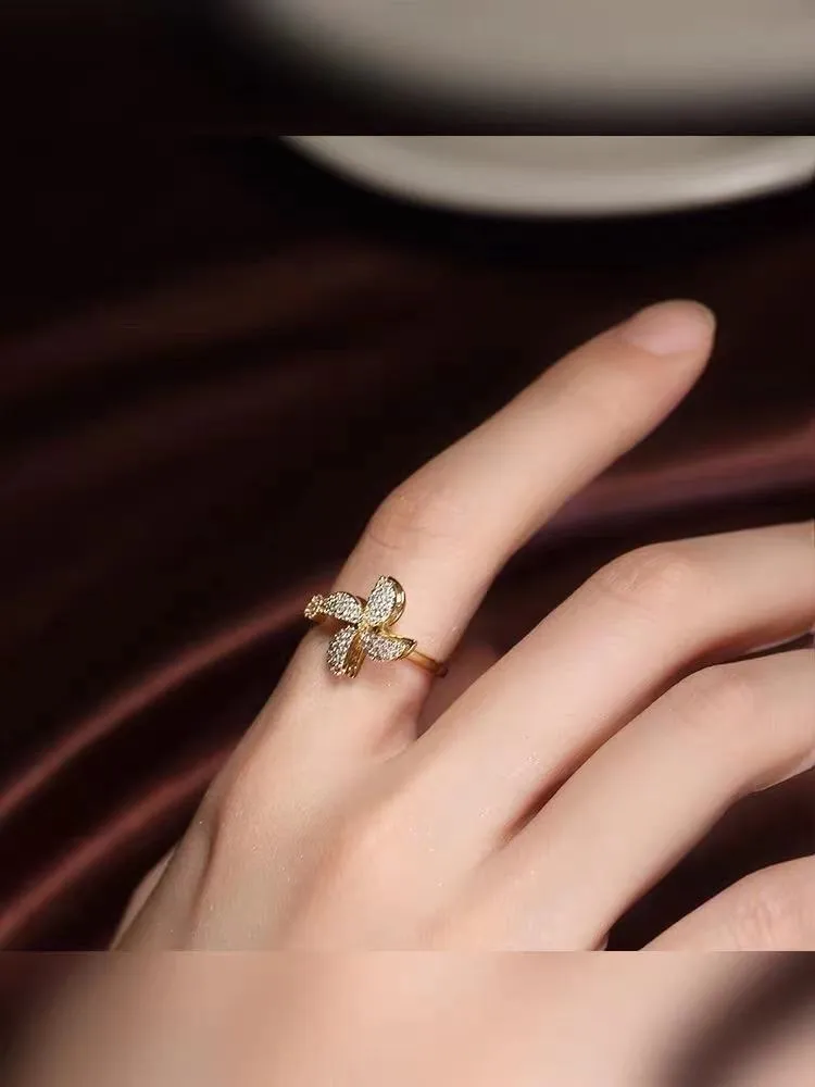 Rotating geometric windmill ring in copper with gold or silver electroplated finish