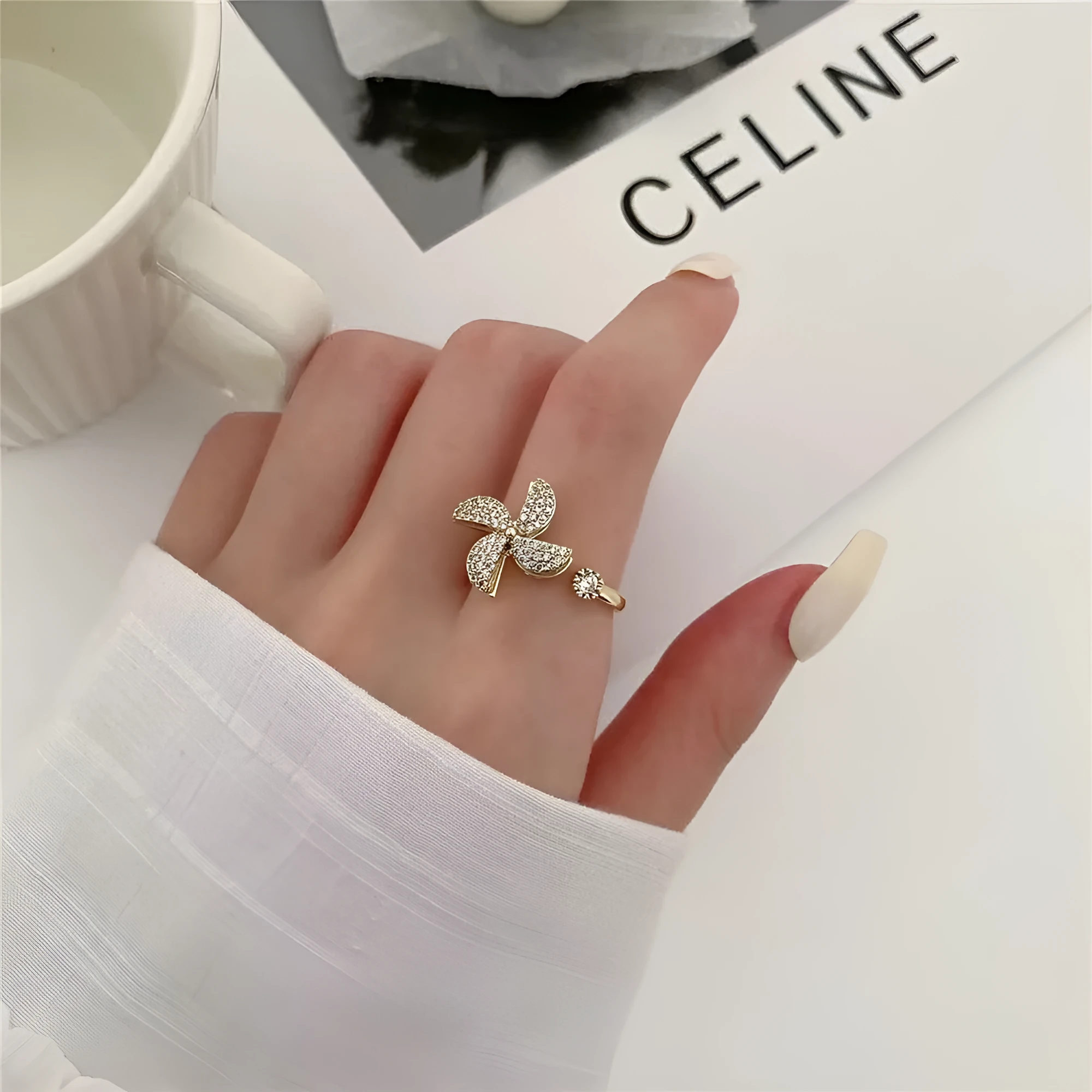 Rotating geometric windmill ring in copper with gold or silver electroplated finish