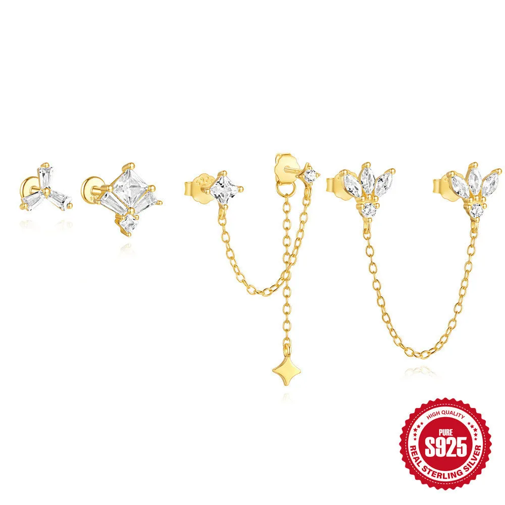 Golden geometric sterling silver earrings with zircon inlays for double piercings