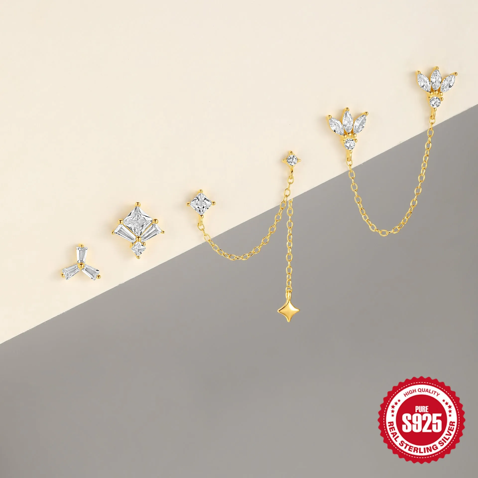 Golden geometric sterling silver earrings with zircon inlays for double piercings