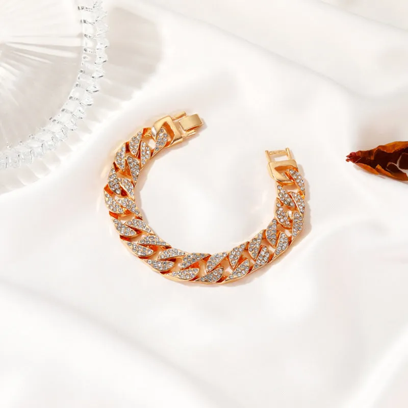 Gold Cuban flat buckle bracelet with crystal rhinestones on wrist, 15mm wide, 8 inch length