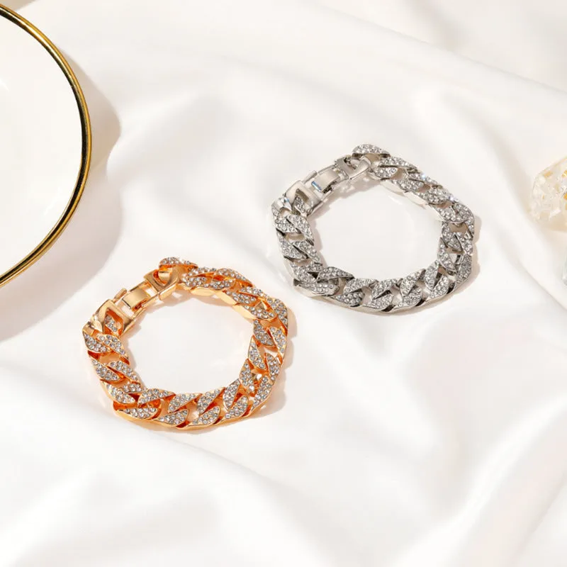 Gold Cuban flat buckle bracelet with crystal rhinestones on wrist, 15mm wide, 8 inch length