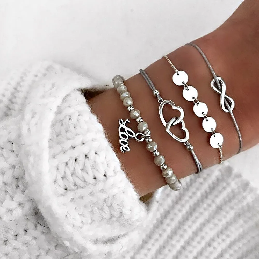 Bohemian bracelet set with alloy vintage bead and boho charm design in bow love style for women