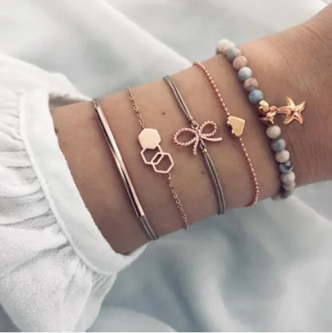 Bohemian bracelet set with alloy vintage bead and boho charm design in bow love style for women