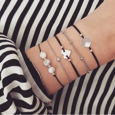 Bohemian bracelet set with alloy vintage bead and boho charm design in bow love style for women