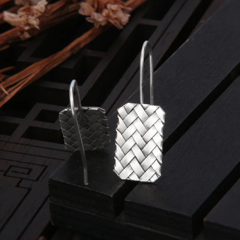 Geometric diamond plaid woven earrings in sterling silver measuring 17.5mm by 11mm