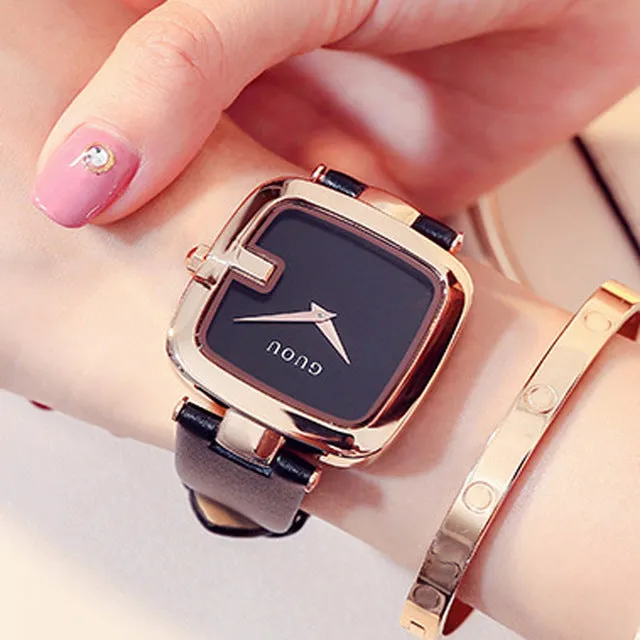 Square quartz watch with 36mm dial, leather strap, rose gold buckle, and mineral glass