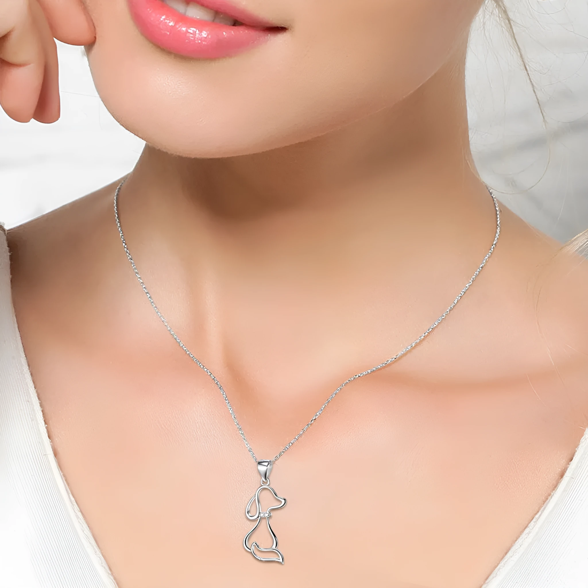 925 sterling silver dog pendant necklace with round bead chain on display