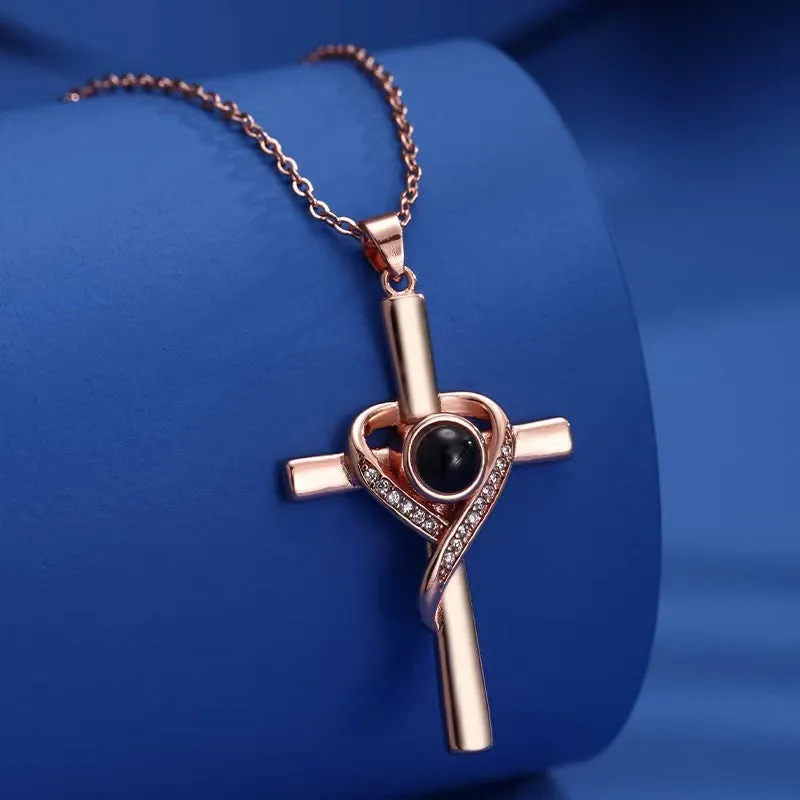'I Love You' projection necklace pendant in copper with heart and cross design