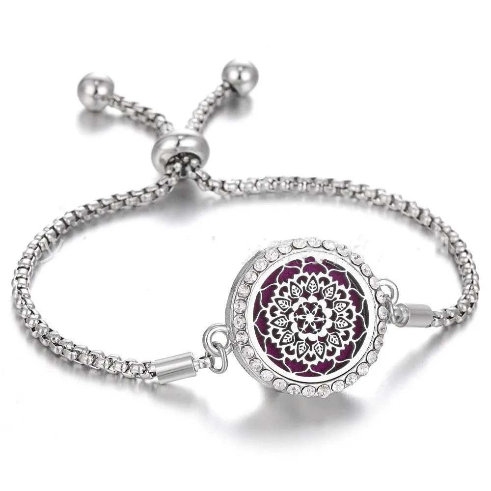Hollow stainless steel adjustable aromatherapy bracelet with 20mm box diameter and electroplated alloy finish on white background