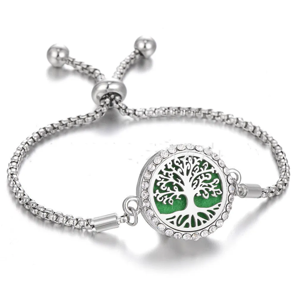 Hollow stainless steel adjustable aromatherapy bracelet with 20mm box diameter and electroplated alloy finish on white background