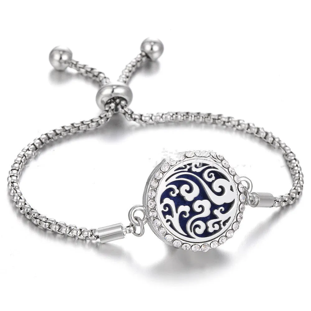 Hollow stainless steel adjustable aromatherapy bracelet with 20mm box diameter and electroplated alloy finish on white background