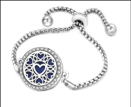 Hollow stainless steel adjustable aromatherapy bracelet with 20mm box diameter and electroplated alloy finish on white background