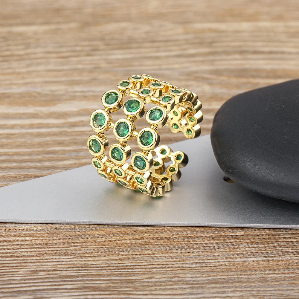 Wide band gold ring with three-layer green zircon stone setting on copper base