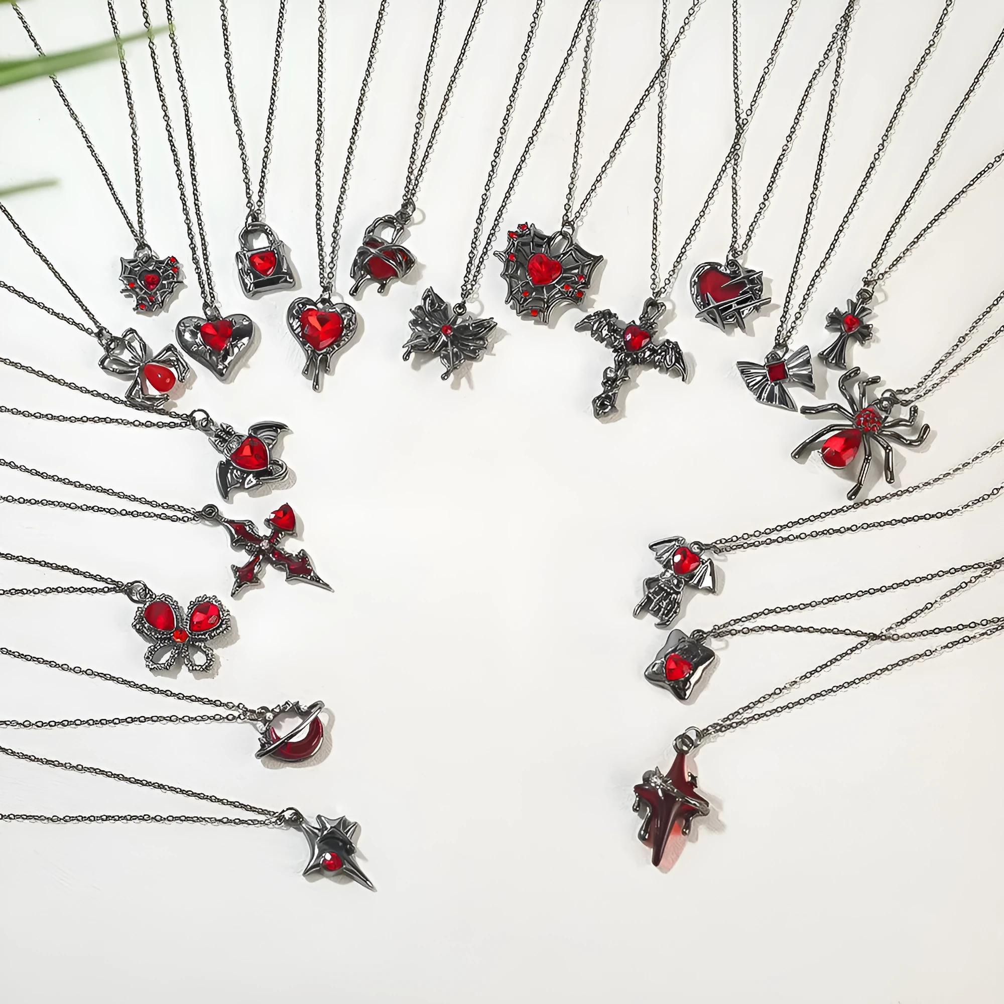 Gothic zinc alloy necklace with electroplated bat and spider pendant designs for Halloween.