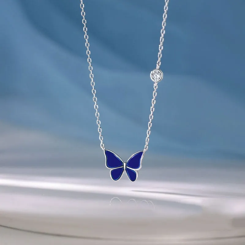 S925 silver butterfly necklace with white silver colour-change pendant on display