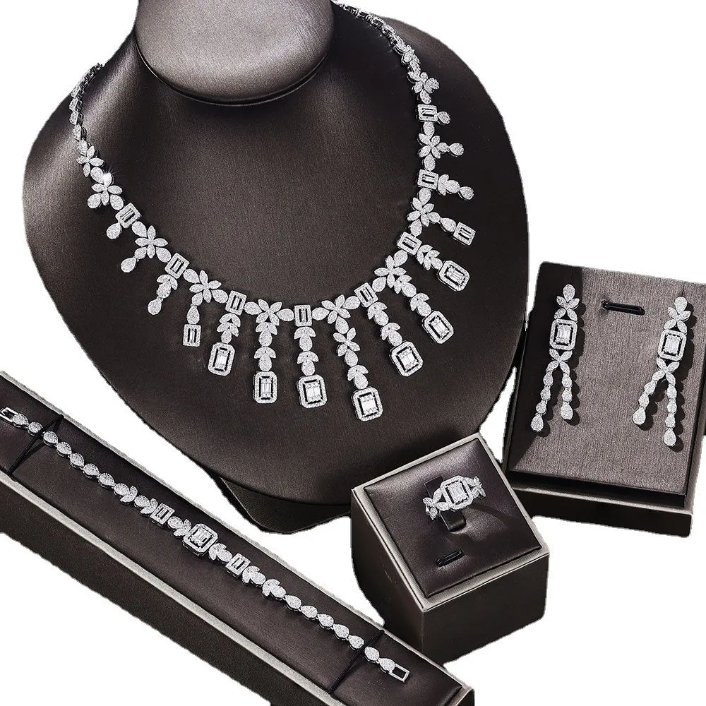 White zircon copper jewellery set with necklace, earrings, bracelet, and ring for women