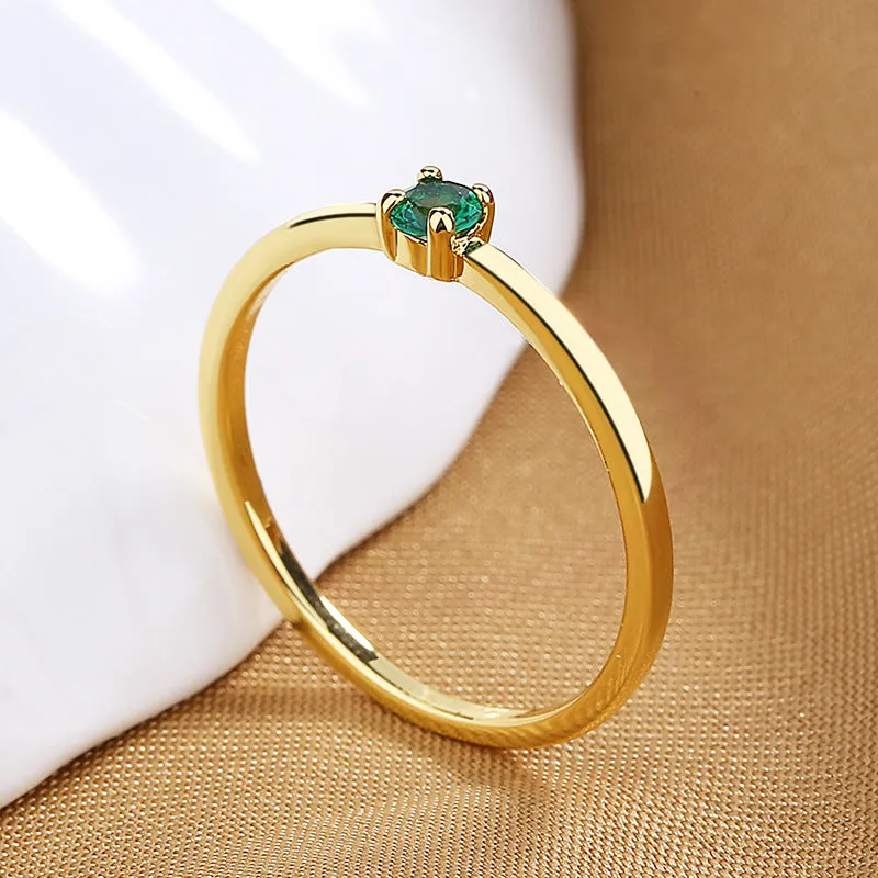 Geometric copper women's ring with single diamond in circle design, shown in available colours.