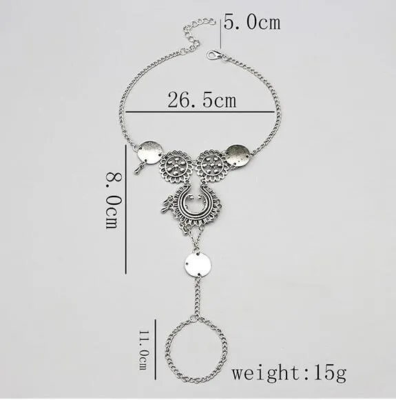 Antique silver hollow flower chain anklet with teardrop shape on a surface, 24cm foot jewellery for women