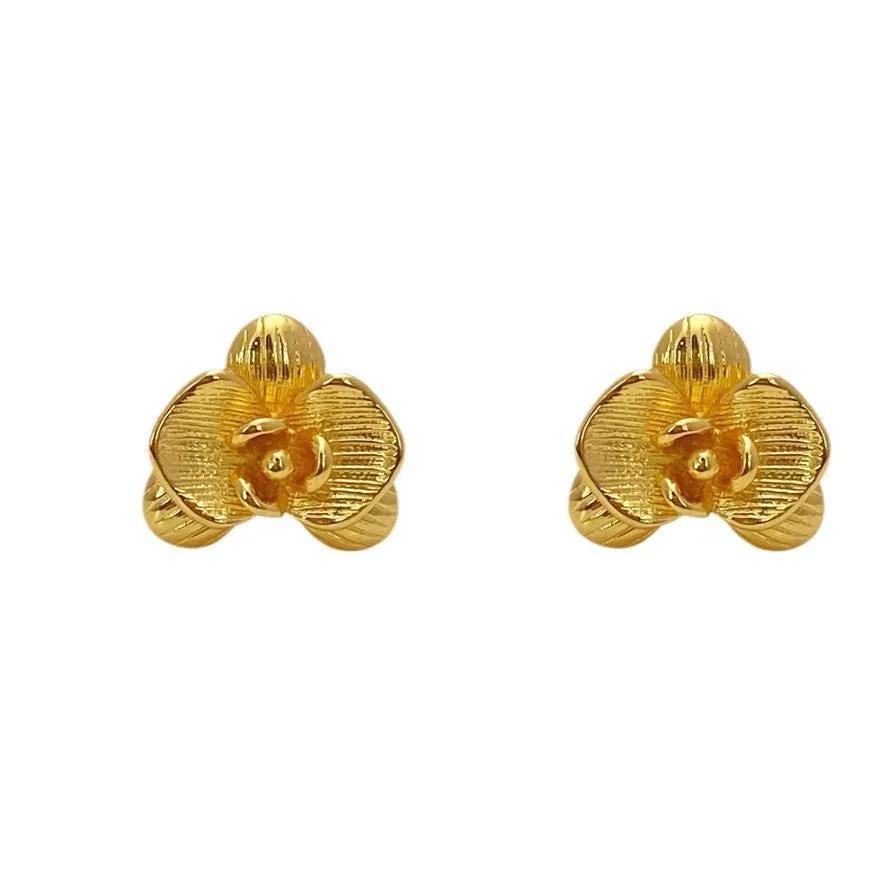 Retro floral earrings for women in gold and silver colours with petal design