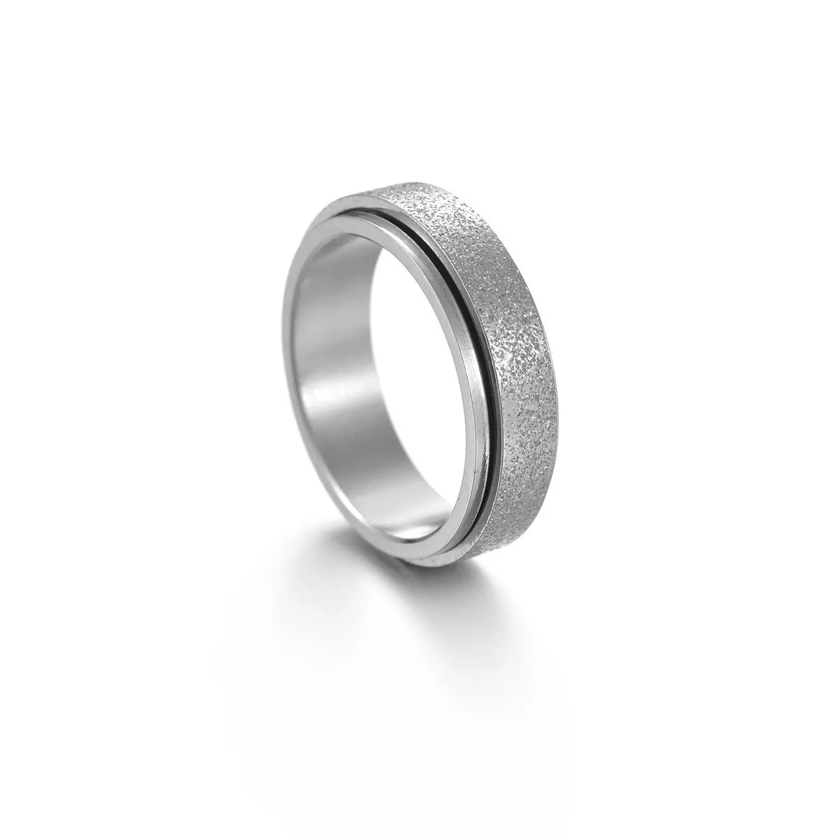 Titanium steel star moon ring in glossy finish on a neutral background, showing celestial motif and band width