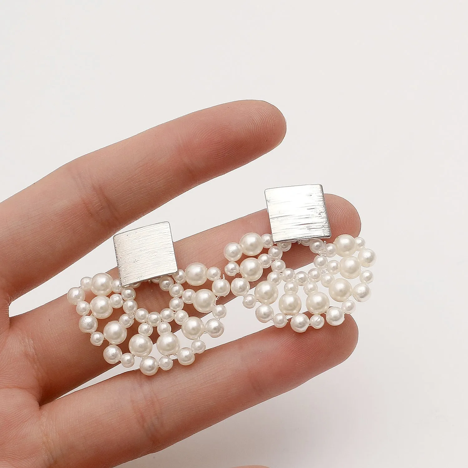 Handmade pearl woven scalloped stud earrings in 14K true gold electroplated alloy with inlaid pearls