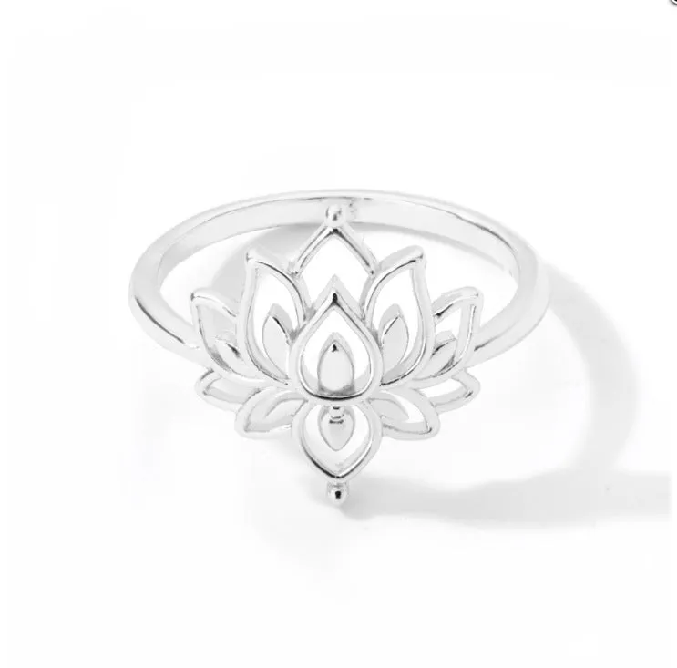 Stainless steel ring with gold electroplated lotus and moon-sun plant design, 9mm face width