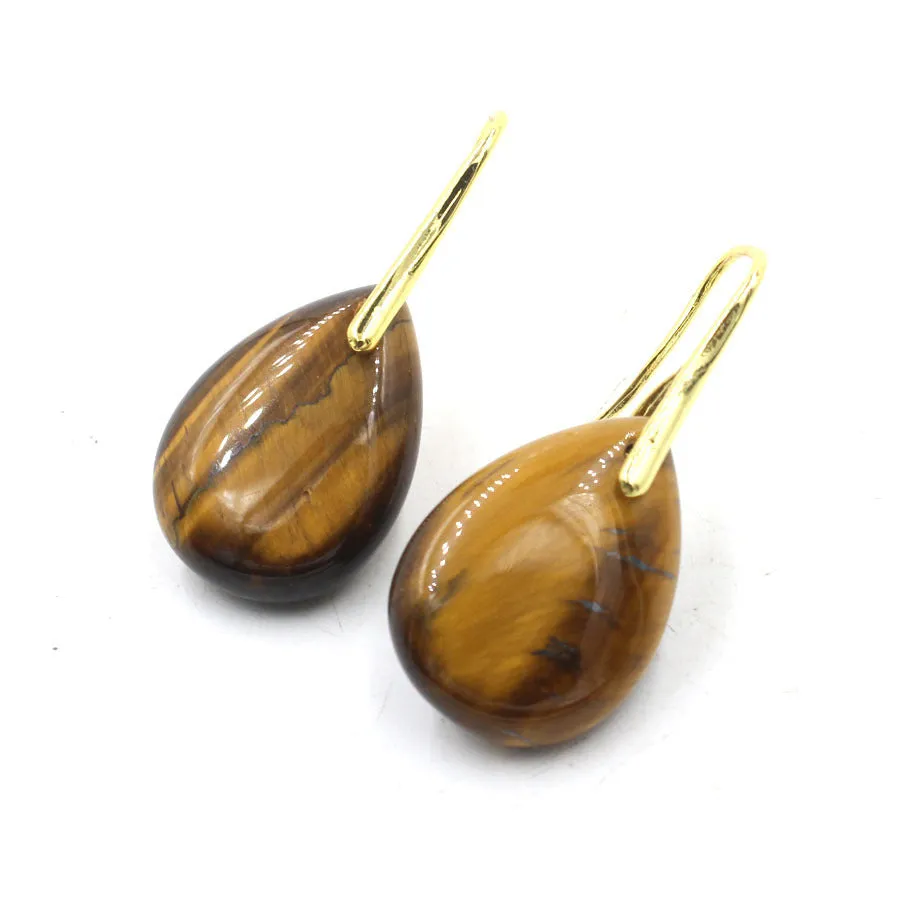 A pair of geometric water drop shaped earrings made from crystal in an electroplated finish.